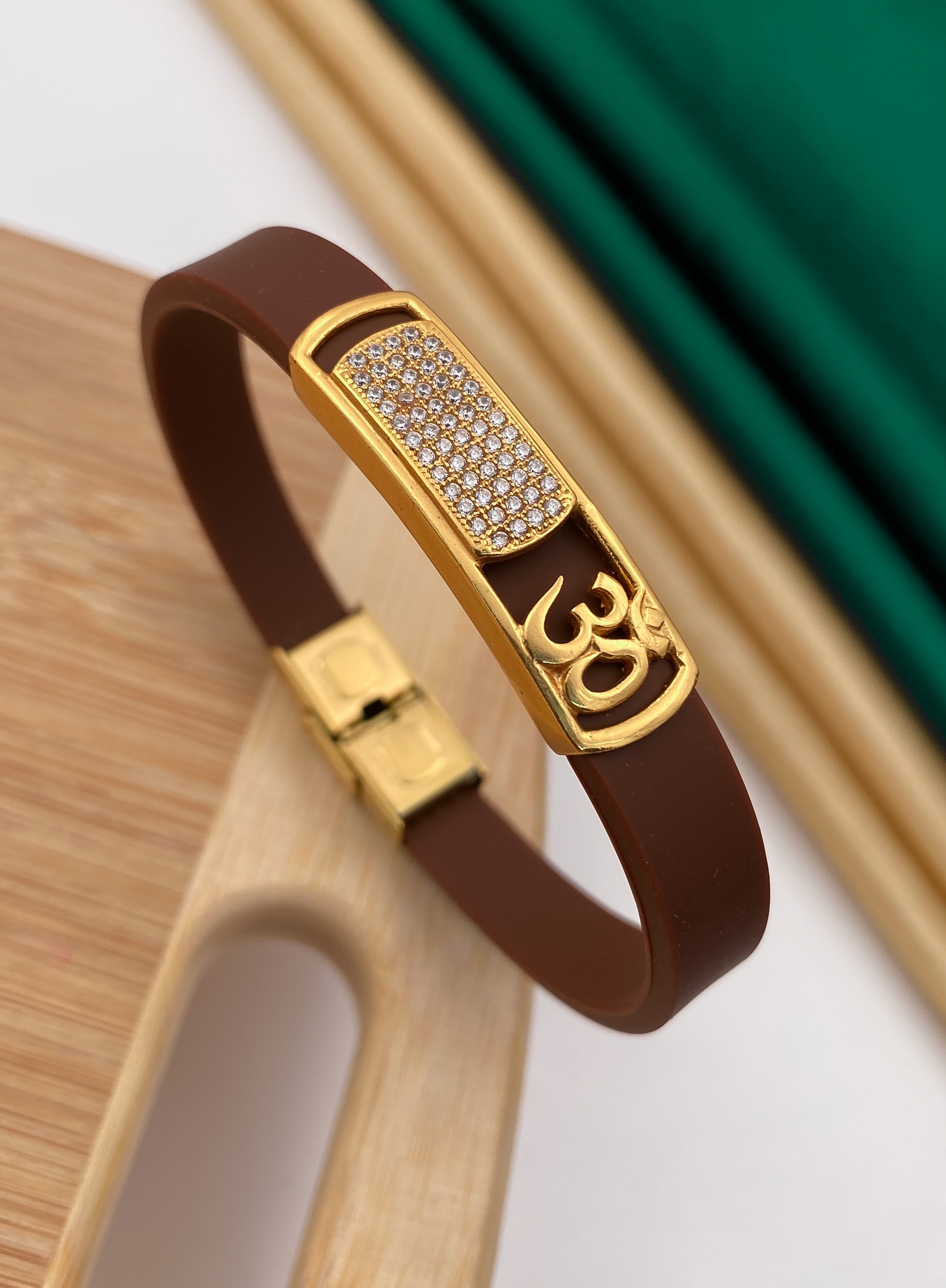 Om gold plated diamonds in brown silicone bracelet for men