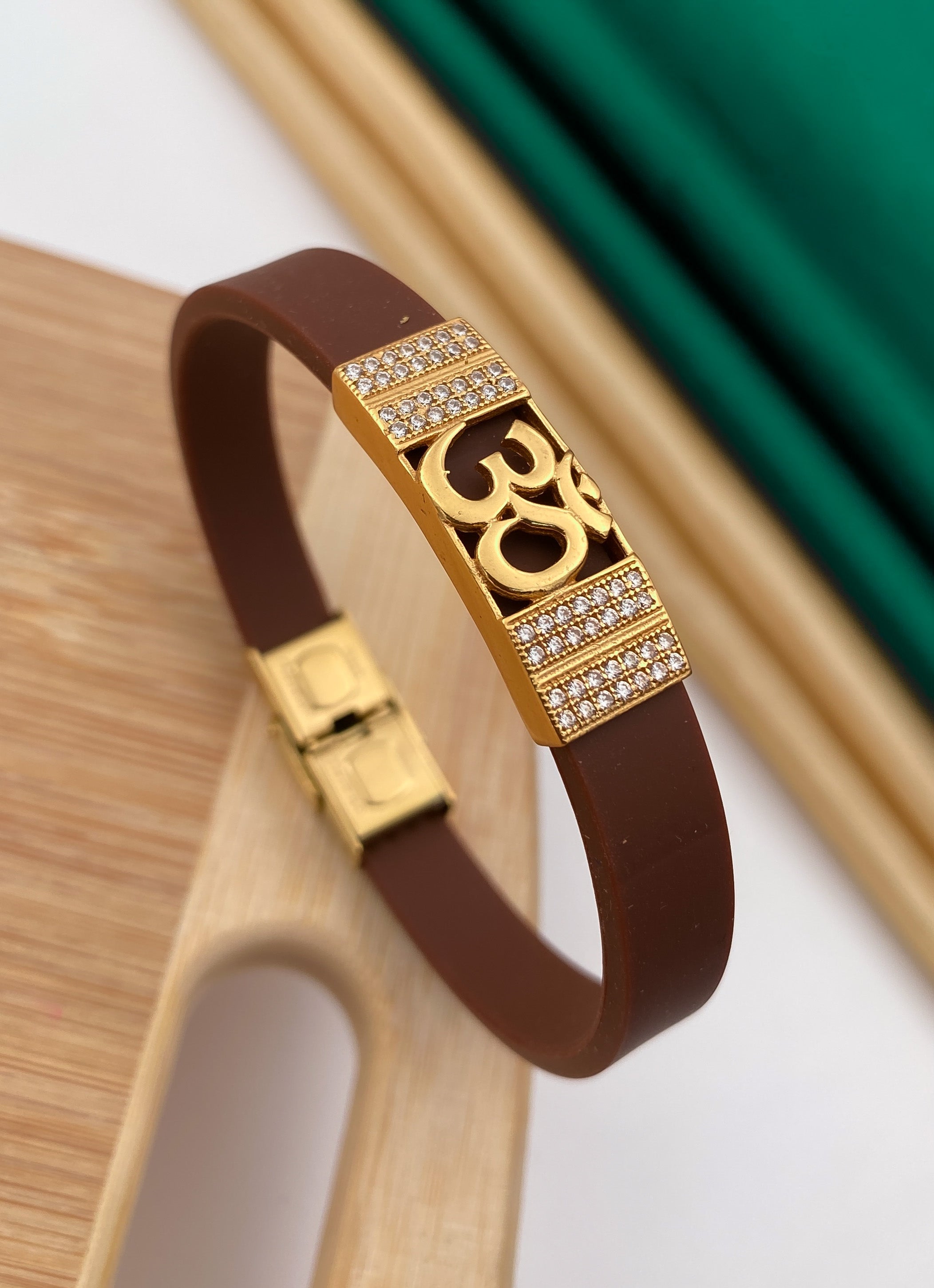 Om gold plated diamonds in brown silicone bracelet for men