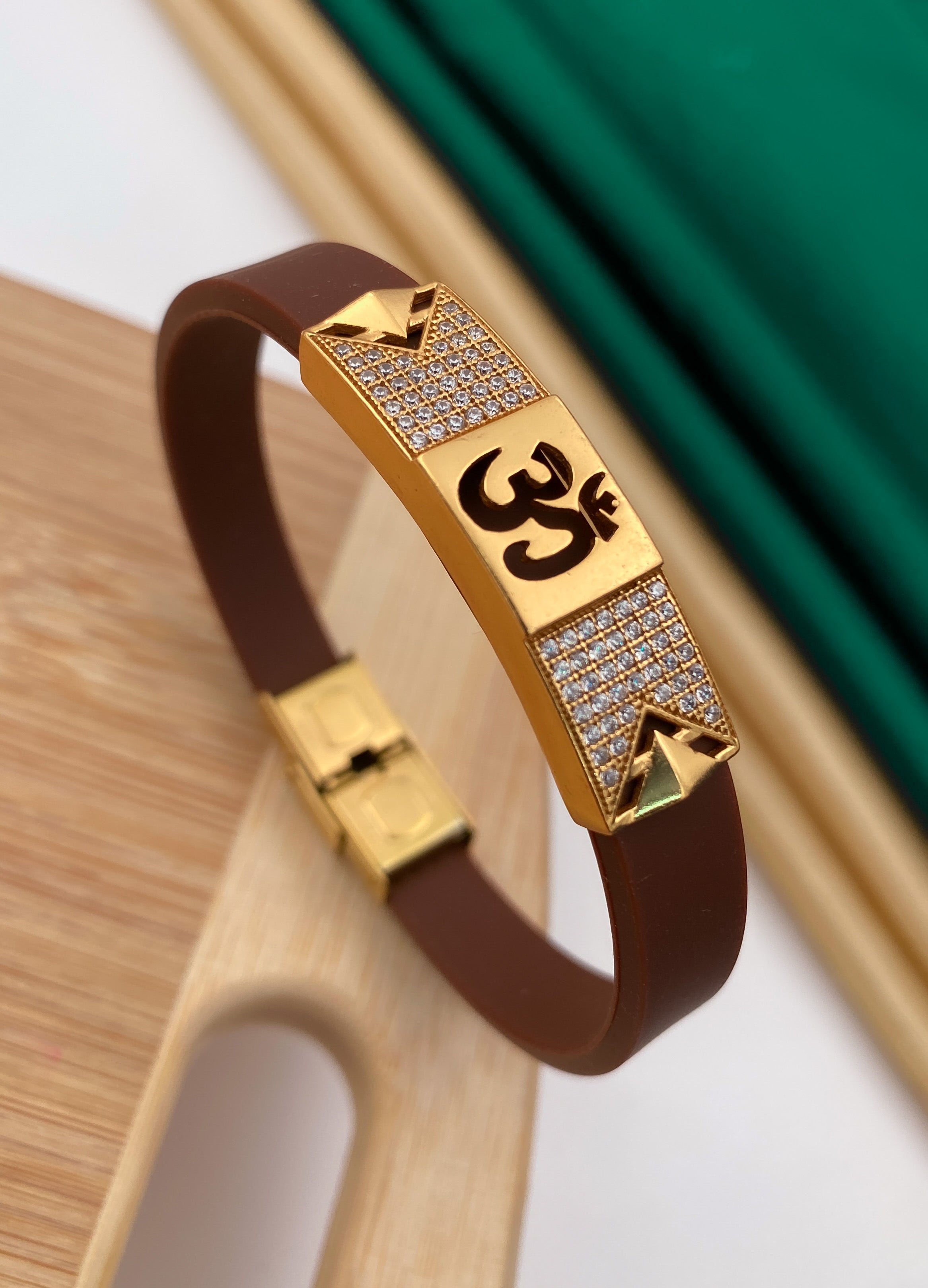 Middle om gold plated diamonds in brown silicone bracelet for men