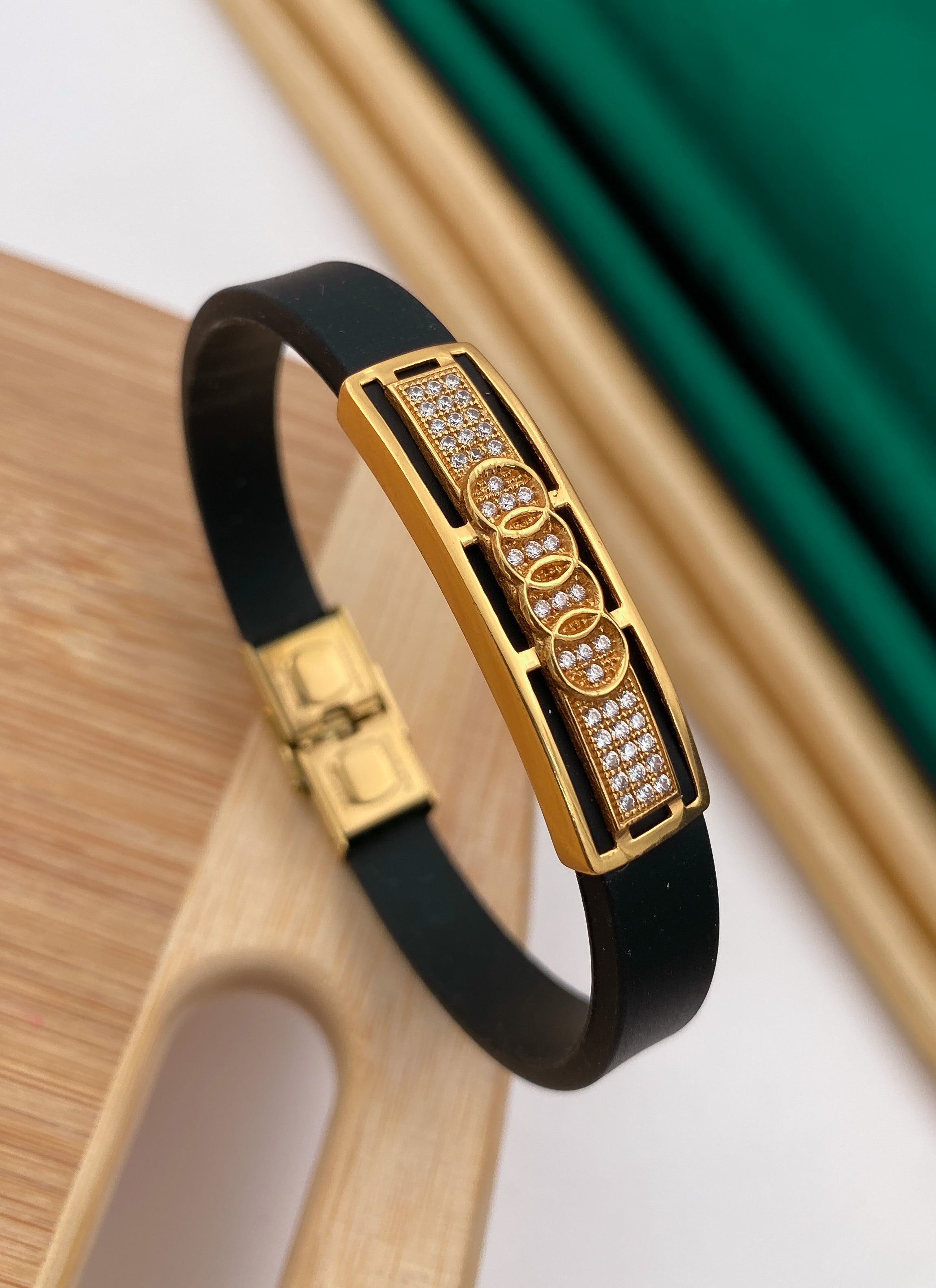 Audi gold plated diamonds in black silicone bracelet for men