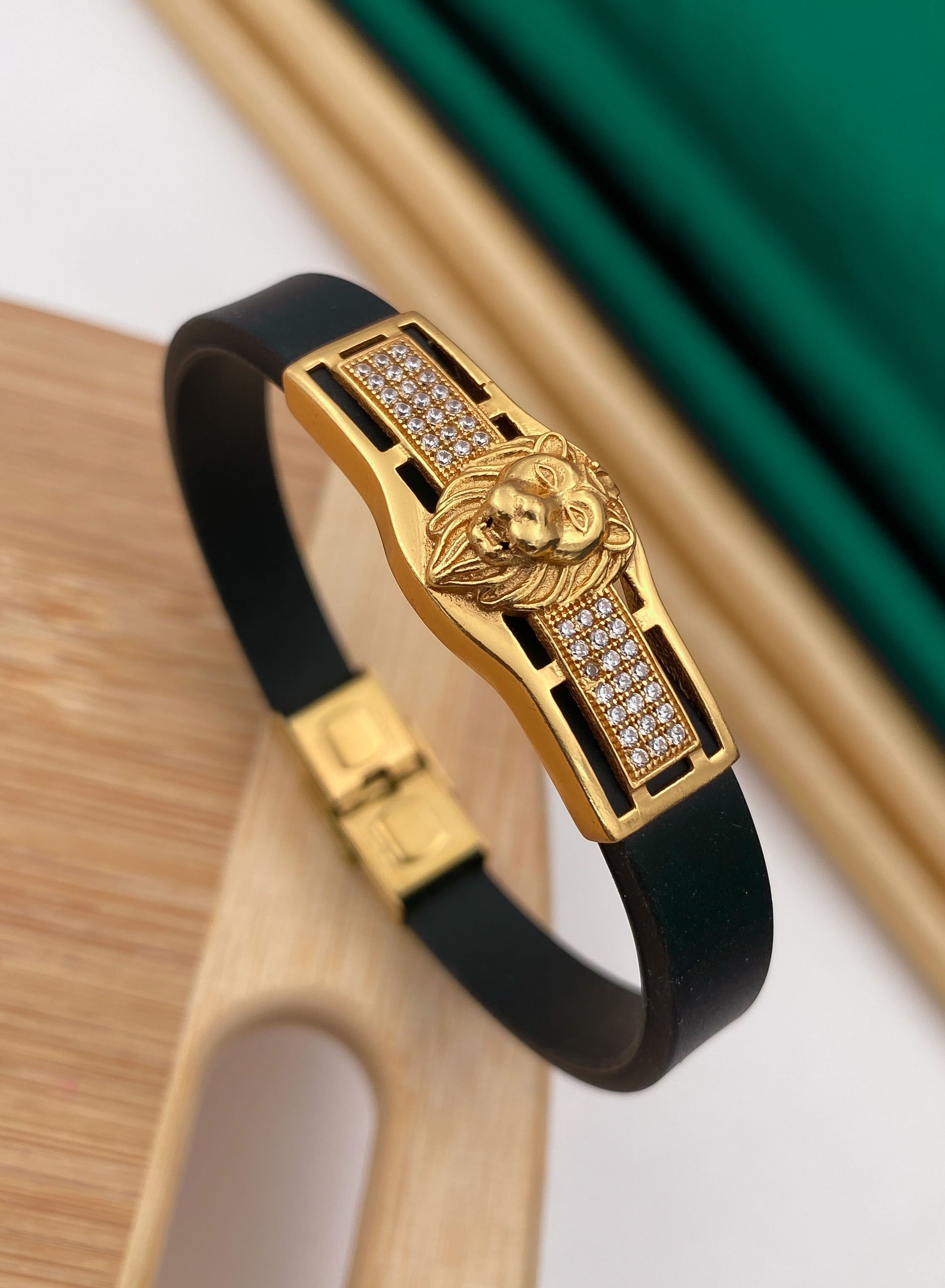 Lion gold plated diamonds in black silicone bracelet for men